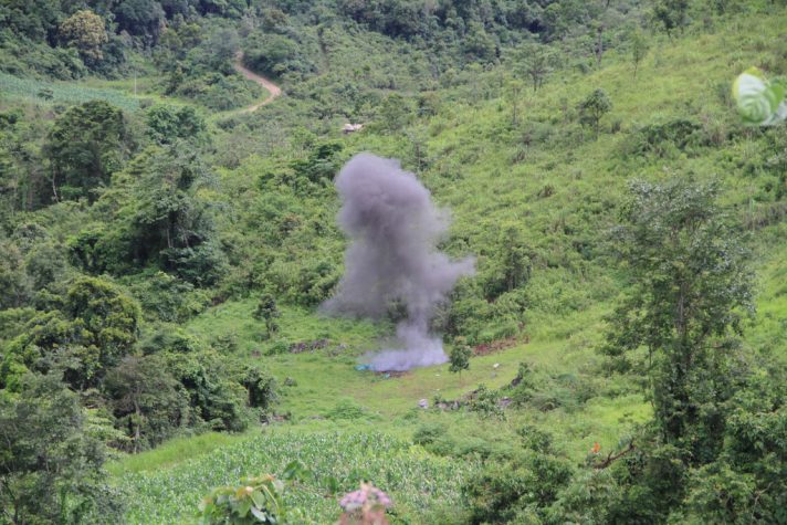 A controlled explosion of a UXO in Xieng Khouang province, helping to make the field safe for the farmer to expand their crops. Photo by Mines Advisory Group, Flickr, taken 29 June 2010. Licensed under CC BY-SA 2.0.