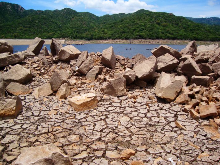 Parched earth in Núi Chúa National Park, Ninh Thuan, Vietnam. Photo by  Gavin White via Flickr. Licensed under CC BY-NC-ND 2.0.